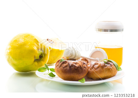 Pastries. Sweet buns with quince and honey filling 123353218