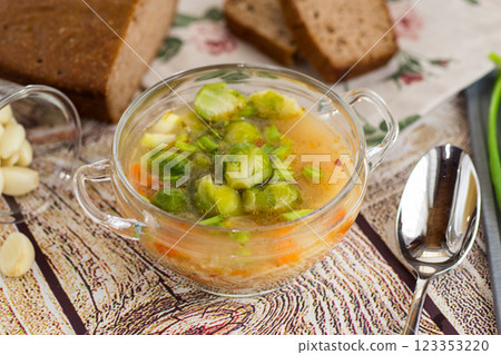 Vegetable Soup with Brussels Sprouts in a Glass Plate Vegetable Soup with Brussels Sprouts in a Glass Plate 123353220