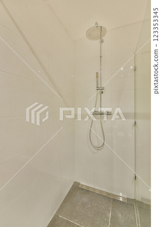 A sleek and contemporary shower space featuring clean lines, neutral colors, and a spacious layout ideal for modern bathroom aesthetics. A sleek and contemporary shower space featuring clean lines, neutral colors, and a spacious layout ideal for modern bathroom aesthetics. 123353345