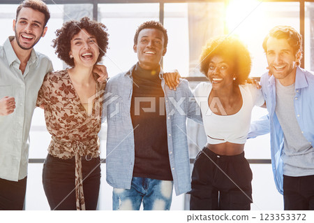 a group of successful business diverse people in the office stands embracing a group of successful business diverse people in the office stands embracing 123353372