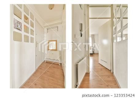 A stylish and modern interior hallway featuring minimalistic decor, wooden flooring, and well-placed mirrors that reflect light for an inviting atmosphere. 123353424