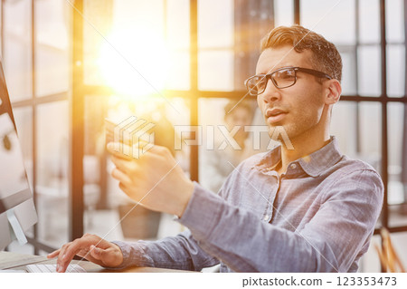 Side view ceo businessman using typing on computer pc laptop working in contemporary office 123353473