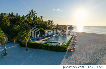 Aerial views of Velavaru Island at sunset in Maldives Aerial views of Velavaru Island at sunset in Maldives 123353728
