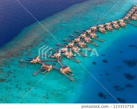 Aerial views of Velavaru Island at sunset in Maldives Aerial views of Velavaru Island at sunset in Maldives 123353738
