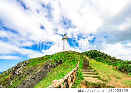 Okanzaki Lighthouse shining against the blue sky – Visit the famous spot of Ishigaki Island 123353869