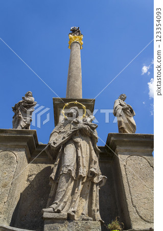 Marian column in historic centre of the town Stribro in Tachov district in the Plzen Region, Czech Republic, sunny summer day 123354093