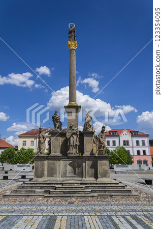 Marian column in historic centre of the town Stribro in Tachov district in the Plzen Region, Czech Republic, sunny summer day Marian column in historic centre of the town Stribro in Tachov district in the Plzen Region, Czech Republic, sunny summer day 123354095