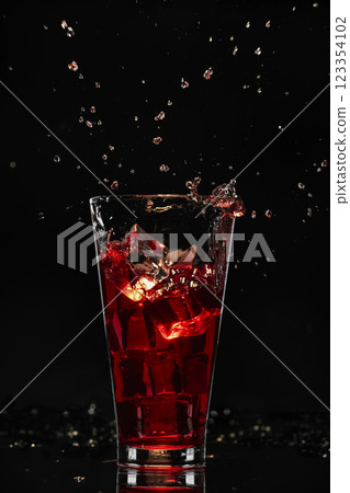 Red cocktail with ice Red cocktail with ice 123354102