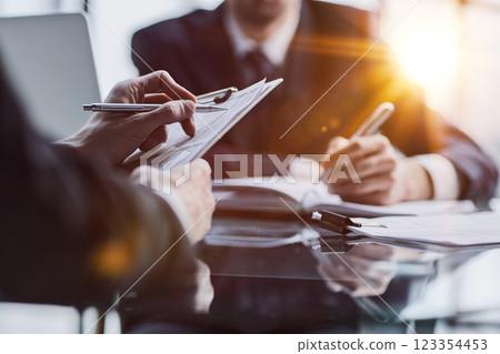 Financial Business man analyze the graph of the company's performance to create profits and growth 123354453