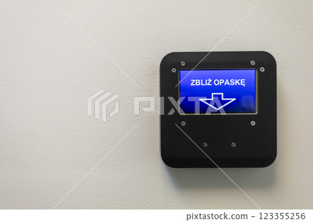Elevator Control Panel that Features a Down Arrow Indicator for User Convenience and Navigation Elevator Control Panel that Features a Down Arrow Indicator for User Convenience and Navigation 123355256