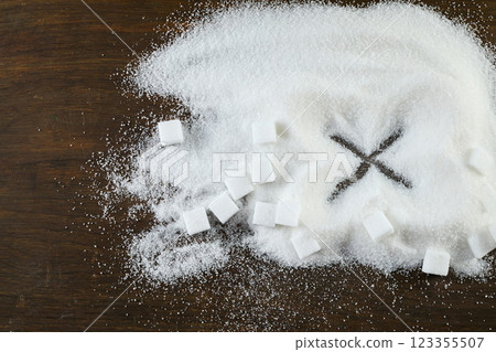 Unhealthy white sugar concept. Scattered Sugar Cubes 123355507