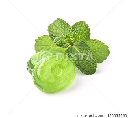 Mint candy with mint leaves on white backgrounds 123355563