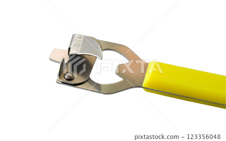 Old can opener on white background. Old can opener on white background. 123356048