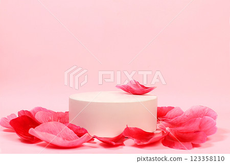 Abstract elegant background with light podium and peonies and rose petals, minimal floral arrangement, empty showcase for display or presentation of cosmetic products, natural products concept, 123358110
