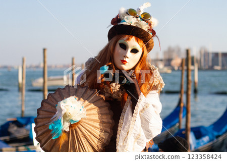 beautiful venetian masks on people during carnival in venice beautiful venetian masks on people during carnival in venice 123358424