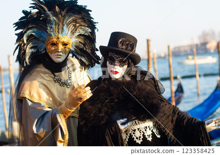 beautiful venetian masks on people during carnival in venice beautiful venetian masks on people during carnival in venice 123358425