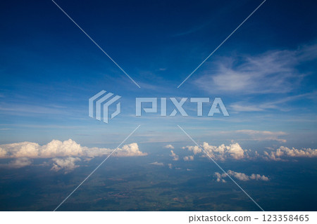 beautiful thick clouds in the sky from the height of the plane 123358465