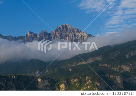 beautiful landscape of rocky mountains against blue sky 123358751