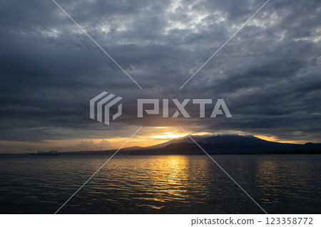 beautiful landscape of mountains on the sea coast at sunset 123358772
