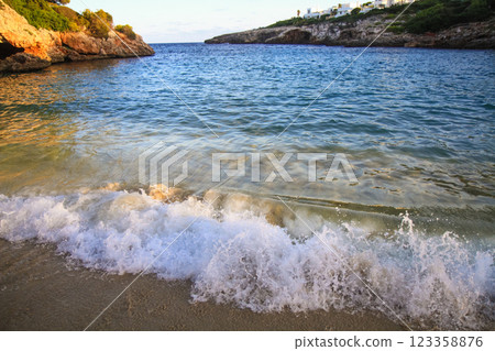 horizon on a beautiful seascape from a rocky shore 123358876