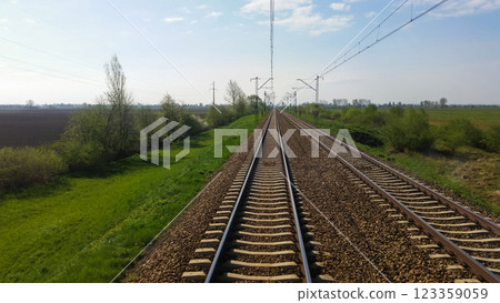 riding in the last carriage along the railway track 123359059