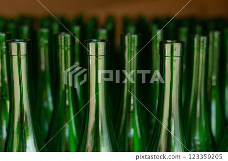 close up of many empty glass green bottles close up of many empty glass green bottles 123359205
