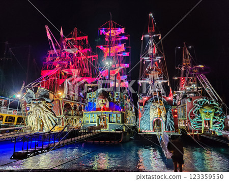 beautiful ships and boats are moored near the shore beautiful ships and boats are moored near the shore 123359550