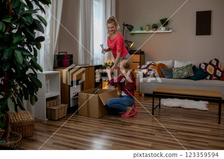 Joyful Organizing in a Cozy and Inviting Living Room Space for Everyone to Enjoy and Share 123359594
