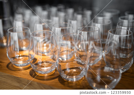 empty clean glass glasses for alcoholic drinks in a restaurant on a bar counter empty clean glass glasses for alcoholic drinks in a restaurant on a bar counter 123359930