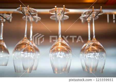 empty clean glass glasses for alcoholic drinks in a restaurant on a bar counter 123359931