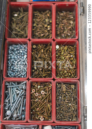 many different screws in the organizer of master for work many different screws in the organizer of master for work 123359990