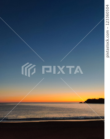 beautiful dramatic landscape of sunset on the sea beach 123360504