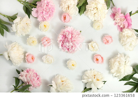 Floral arrangement with rose and peony flowers on a light background, summer banner, greeting card for wedding, holiday, birthday, template for design, selective focus Floral arrangement with rose and peony flowers on a light background, summer banner, greeting card for wedding, holiday, birthday, template for design, selective focus 123361658