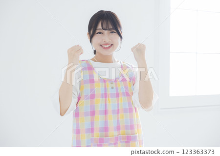 Smiling young nursery teacher Smiling young nursery teacher 123363373