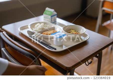 Lunch tray on a school desk Lunch tray on a school desk 123364019