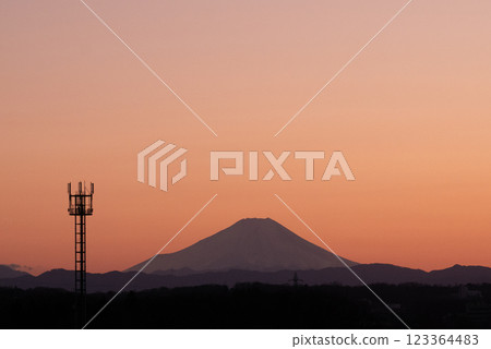 Mount Fuji and a tower in the sunset 123364483