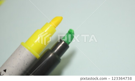 Yellow and green highlighter markers Yellow and green highlighter markers 123364738