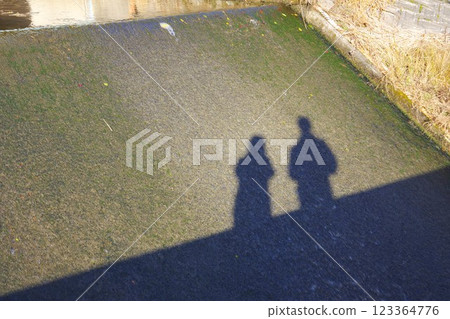 Silhouette of a couple walking Silhouette of a couple walking 123364776