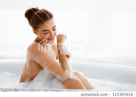 Spa Treatment. Young Woman Enjoying Bubble Bath And Relaxing, Free Space Spa Treatment. Young Woman Enjoying Bubble Bath And Relaxing, Free Space 123365918