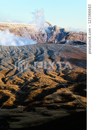 Mt. Aso in winter, emitting smoke; volcanic landscape 123366683