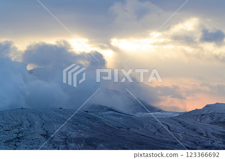 Mt. Aso in winter, emitting smoke; volcanic landscape 123366692