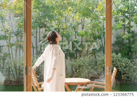 Woman relaxing on the veranda 123366775