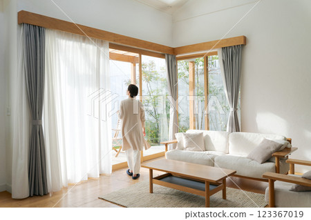Woman relaxing in the living room 123367019