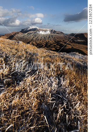 Mt. Aso in winter, emitting smoke; volcanic landscape 123367284