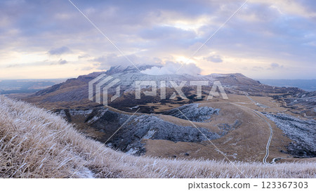 Mt. Aso in winter, emitting smoke; volcanic landscape 123367303