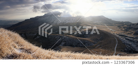 Mt. Aso in winter, emitting smoke; volcanic landscape Mt. Aso in winter, emitting smoke; volcanic landscape 123367306