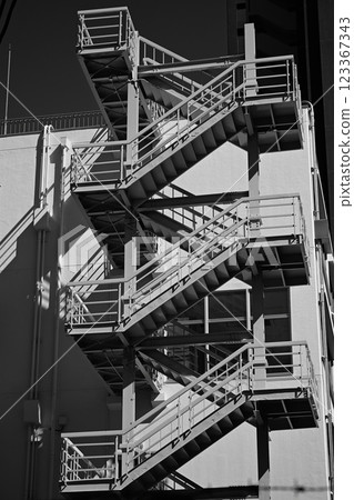 Monochrome photo of an emergency staircase Monochrome photo of an emergency staircase 123367343
