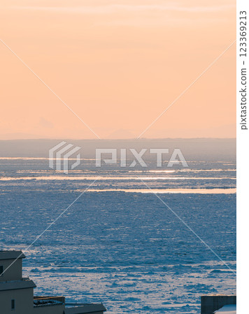 Drift ice ashore, seen from the city Drift ice ashore, seen from the city 123369213