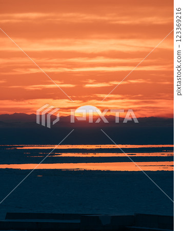Sunset over the sea 123369216