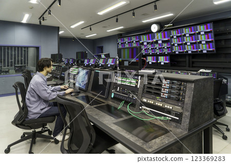 A director working in a TV station's control room. Filming cooperation: SKY Perfect TV Tokyo Media Center A director working in a TV station's control room. Filming cooperation: SKY Perfect TV Tokyo Media Center 123369283